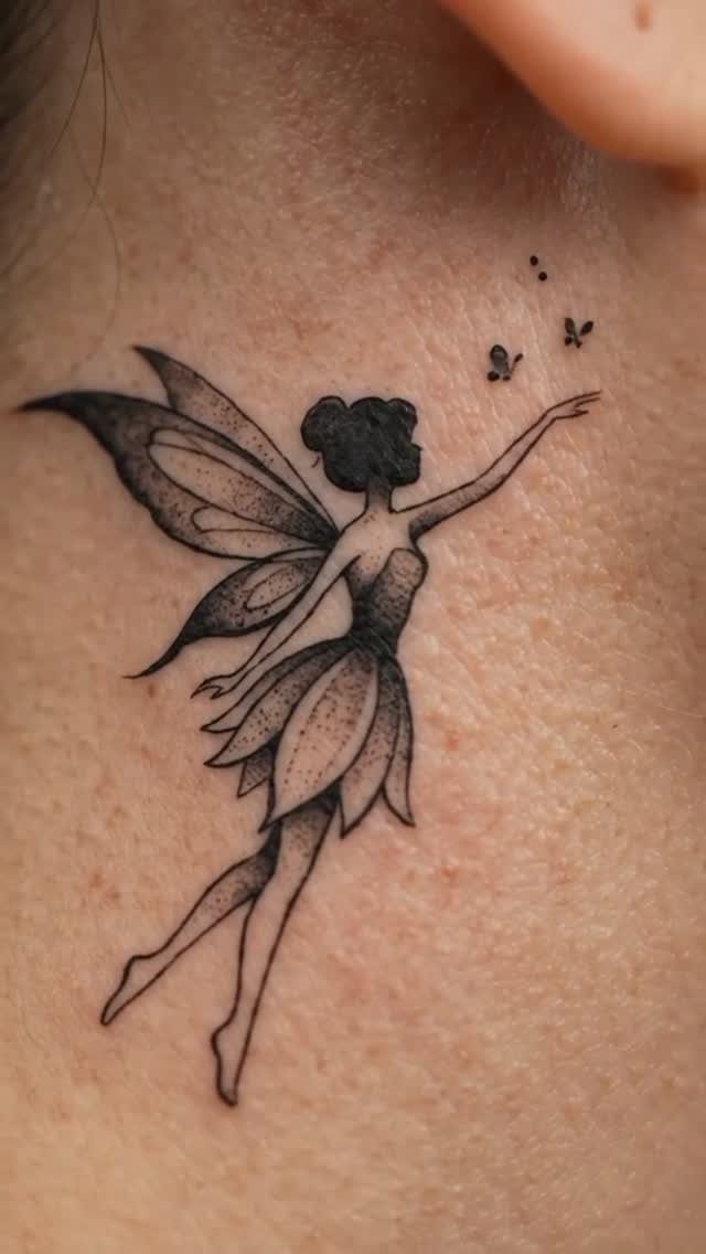 21 Side Neck Tattoo Ideas for Bold, Meaningful Designs 20 Fairy tattoo with wings and petal skirt on the side of a neck.