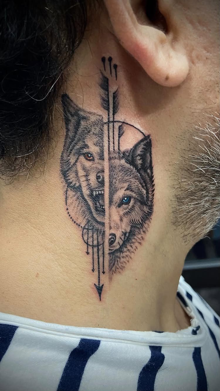 21 Side Neck Tattoo Ideas for Bold, Meaningful Designs 9 Wolf head tattoo on a side neck with a vertical arrow detail