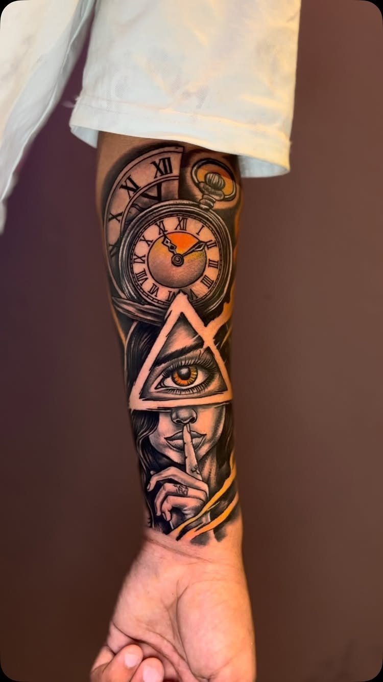 Clock tattoo on a forearm featuring a pocket watch and a mystical eye.